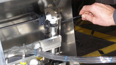 Stripping station format adjustment