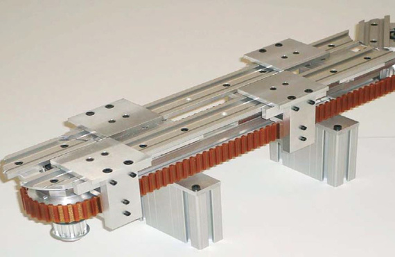 Handling device feed system