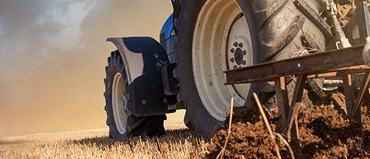 Farm machinery in field