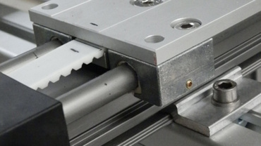 Positioning arm stacker drylin toothed belt axis