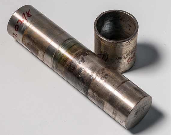 Metal composite bearings on soft stainless steel shaft