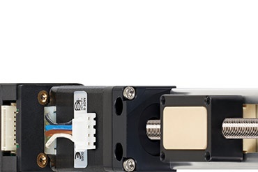 Miniature linear axis with motor